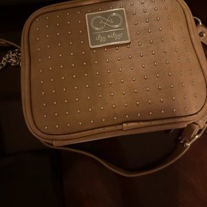 It’s Ritzy crossbody diaper bag with changing pad